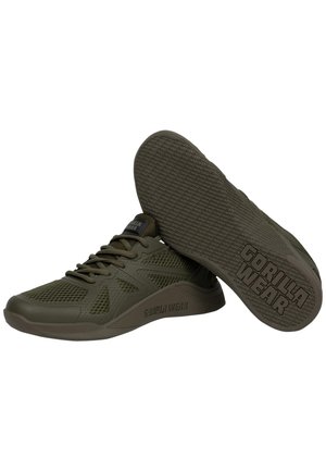 Groene mesh sneakers met een getextureerde zool, voorzien van een logo aan de zijkant en een gladde neuscap voor extra duurzaamheid.