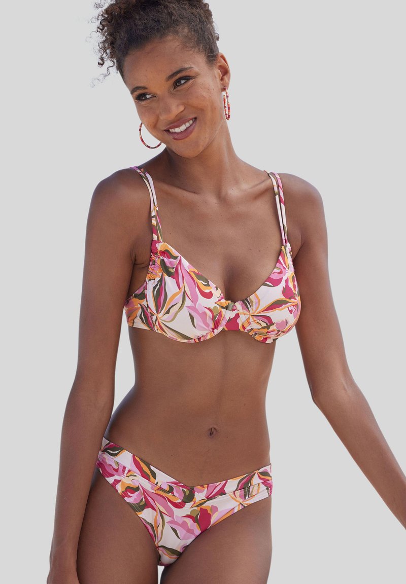 Bikini set s kvetinovým vzorom v odtieňoch ružovej, oranžovej a zelenej. Mäkko tkanina s nastaviteľnými popruhmi a dizajnom spodných nohavičiek s nízkym pásom.