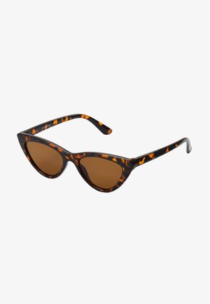 Cat-eye sunglasses with a black and orange tortoiseshell frame, brown lenses, and sleek, pointed tips. Features a minimal logo on the temple.