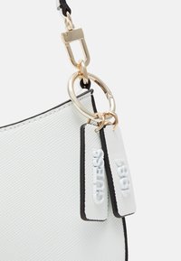 Guess NOELLE TOP ZIP SHOULDER BAG - Handbag - white