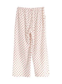 Hvide bomulds pyjamasbukser med et print af små røde hjerter, elastisk talje og vidde ben.