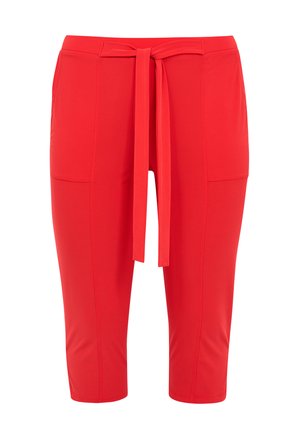Rote, midilange Hose mit vorderer Kordel und sichtbaren Nahtdetails an den Beinen.