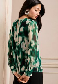 Love & Roses Camicetta - green animal print