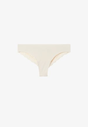 Cream-colored panties with a smooth front and lace trim along the back edges, featuring a scalloped design. Made from soft fabric.