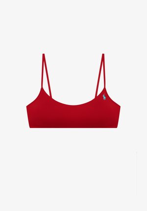 Piros, rövidített fazonú melltartó vékony, állítható pántokkal és apró világoskék hímzett logóval a bal oldalon.