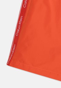 Calvin Klein Swimwear MEDIUM DRAWSTRING - Shorts da mare - acid orange