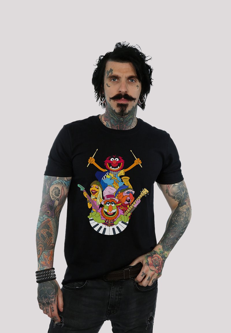 Black cotton t-shirt featuring colorful cartoon characters with musical instruments against a white keyboard graphic. Regular fit.