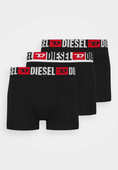 Boxer-briefs noirs avec une ceinture élastique blanche et rouge arborant le logo "DIESEL". Matière douce avec un design ajusté. Lot de trois.