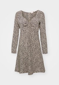 Robe à imprimé léopard en tissu doux, avec manches longues, encolure dégagée et un nœud à l'avant. Silhouette trapèze.