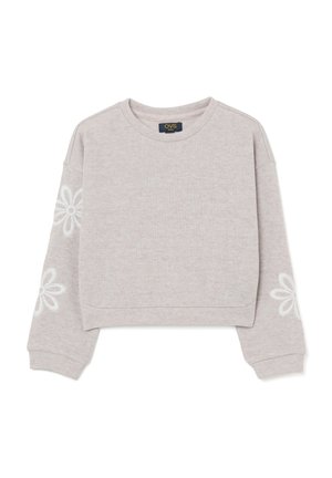 Grijze cropped sweatshirt van zachte stof, met lange mouwen en geborduurde witte bloemen op beide mouwen en een ronde halslijn.
