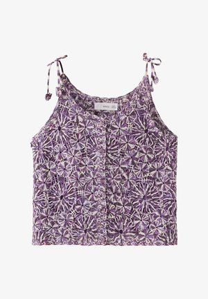 Haut sans manches en crochet floral violet et blanc avec boutons sur le devant et bretelles réglables à nouer sur fond blanc.