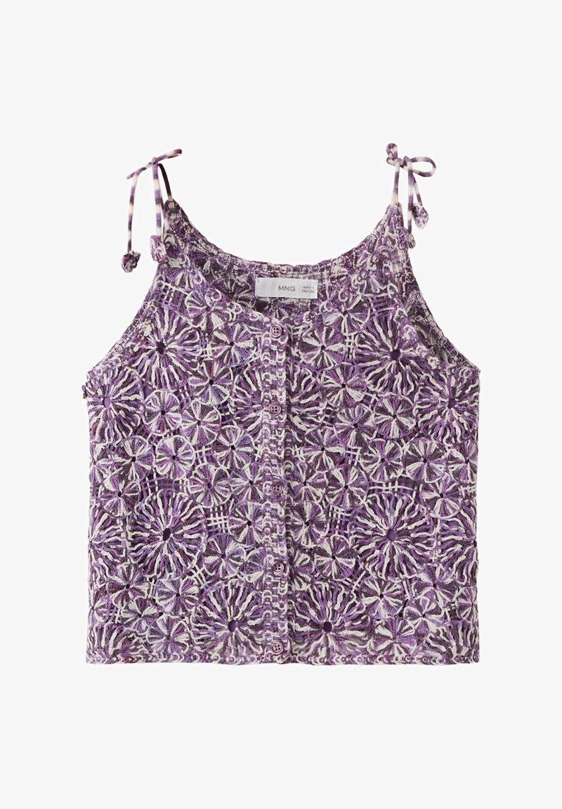 Haut sans manches en crochet floral violet et blanc avec boutons sur le devant et bretelles réglables à nouer sur fond blanc.