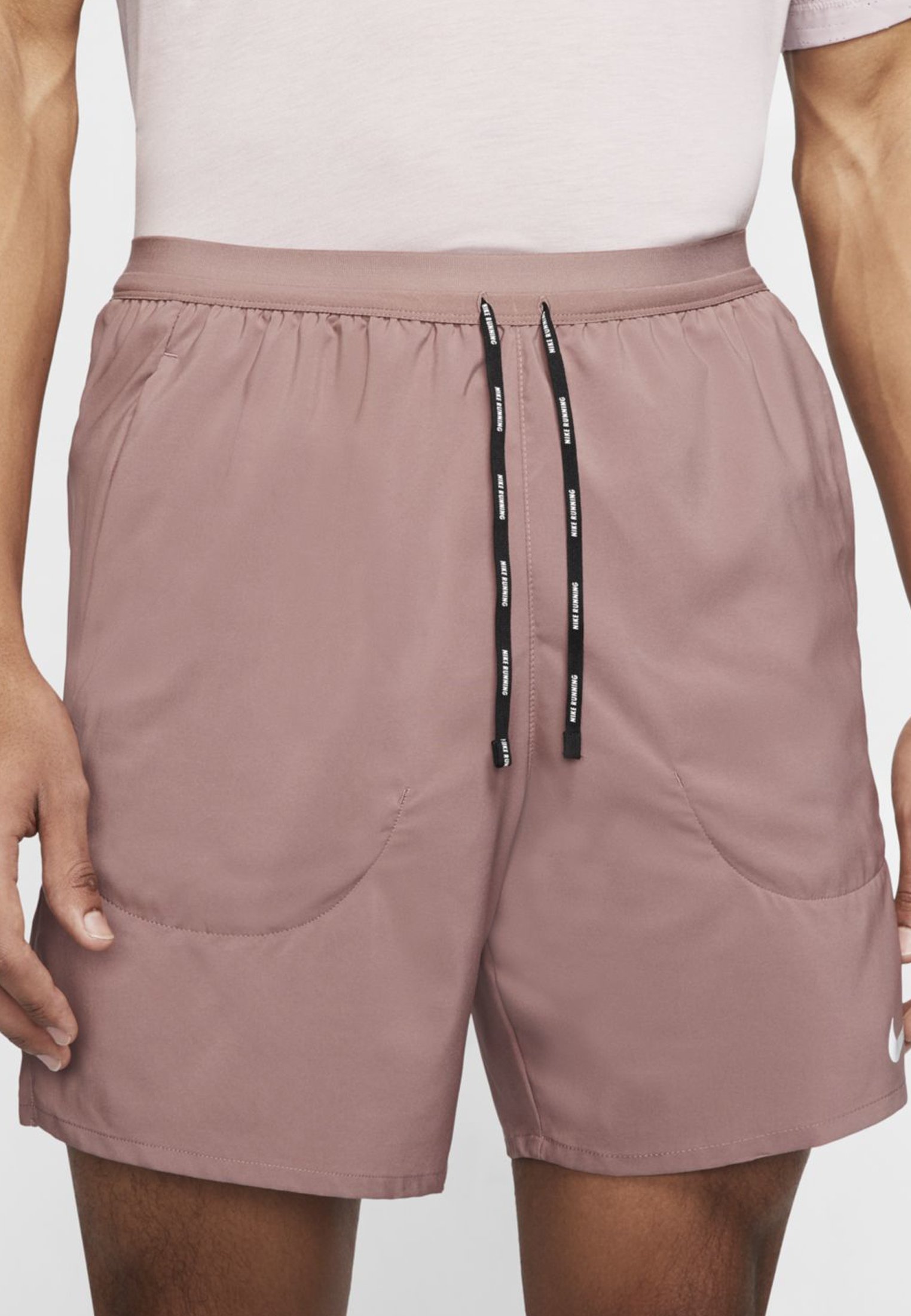 nike flex stride pink