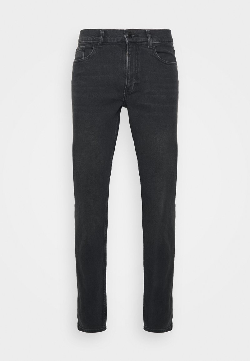 Jean slim noir en denim avec fermeture à boutons et zip à l'avant, poches avant et arrière, présenté sur un fond neutre.