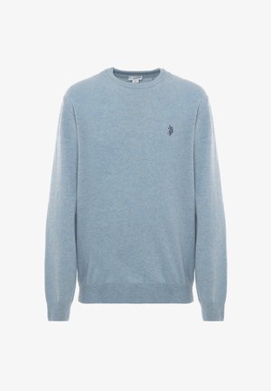 Pullover azzurro chiaro realizzato in morbido tessuto. Design a girocollo con maniche lunghe. Presenta un piccolo logo scuro nella zona sinistra del petto.