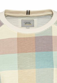 Mønstret ternet skjorte i flere farver med rund hals, i pastelfarver som blå, grøn, beige og brun, lavet af blødt bomuldsstof.