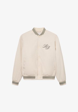 Veste bomber beige avec col, poignets et ourlet en rib d'un vert rayé. Dotée d'une fermeture à boutons et d'un logo "LD" brodé en noir sur la poitrine.