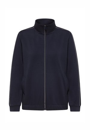 Marinblå jacka med dragkedja och hög krage, slät tyg, kontrasterande vita sidosstreck, två framfickor samt ribbade muddar och fåll.