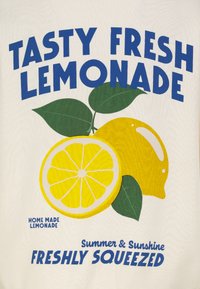 White background with blue and yellow text. Features a yellow lemon, a halved lemon, and green leaves. Text reads "Tasty Fresh Lemonade."
