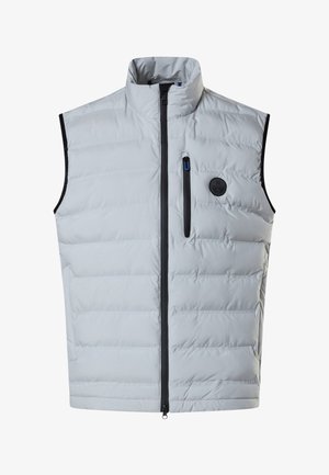 Lysegrå ærmeløs quiltet vest med høj krave, sort lynlås, lynlåslomme på brystet og rund sort logopatch foran.