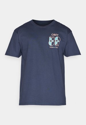 Navy blue cotton t-shirt with short sleeves, featuring a front graphic in pink and light blue, stating "OBEY FREEDOM OF CHOICE."