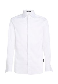 Witte lange mouwen shirt gemaakt van katoen. Het heeft een klassieke kraag, knoopsluiting en manchetten met één knoop. Textuur met een gladde stof.