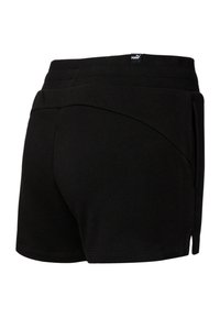 Shorts de sport noirs Puma avec une taille élastique côtelée et des poches latérales, montrés de dos et vue angulée à droite.