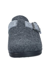 Gray felt clog with a textured surface, featuring a light gray strap and metal buckle. The sole is black and slightly raised.