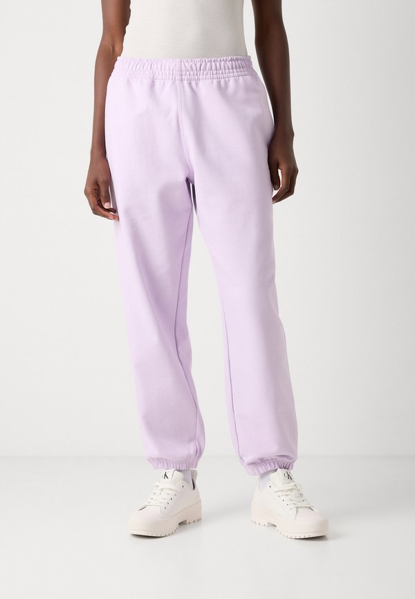 MONOLOGO - Tracksuit bottoms - lavender blush3
