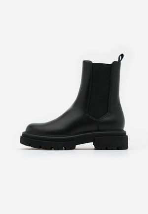 Platform ankle boots - black