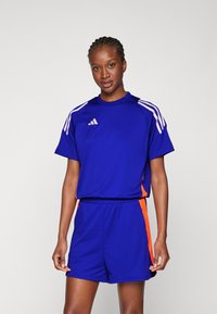 adidas Performance TIRO 24 JUMPSUIT - Overal - lucid blue/app solar red