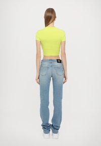 Versace Jeans Couture T-shirts med print - kiwi