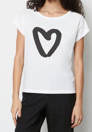 White cotton t-shirt with short sleeves, featuring a large black heart graphic in the center. Lightweight, casual, with a relaxed fit.
