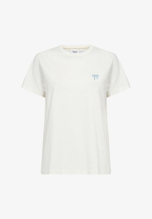 Balta kokvilnas T-krekls ar īsām piedurknēm, kas izceļas ar gaiši zilā izšuvuma loku uz kreisā krūts. Apaļš kakla izgriezums, brīvs piegriezums.