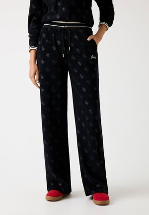 Pantaloni sportivi - schwarz