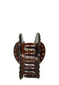 Molletta per capelli in acrilico marrone con dettagli laterali a cerchio, design traforato e gemme color ambra sui bordi, che aggiungono un tocco decorativo.