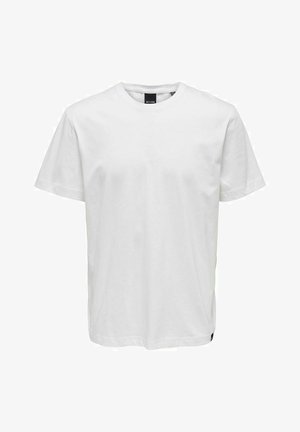 Biała bawełniana koszulka z krótkimi rękawami, okrągłym dekoltem, luźnym krojem i bez wzorów. Posiada małe logo umieszczone blisko dołu.