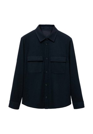 Navy blue button-up shirt with long sleeves, two chest pockets, and a collar. Made of a soft, textured fabric with minimal detailing.