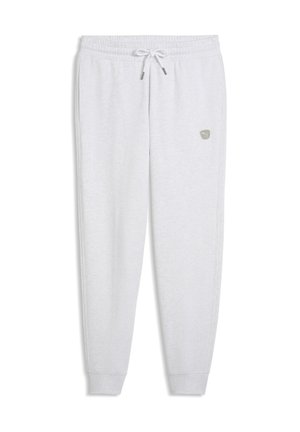 Hvide joggingbukser med elastisk talje og snøre, tilspidsede ben og et lille logo på øverste venstre lår.