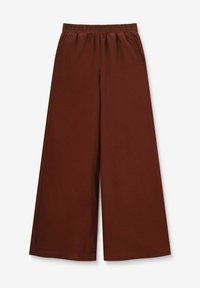 Pantalons amples marron avec une taille élastique, dotés de poches latérales et d'une texture lisse, conçus pour le confort et la liberté de mouvement.