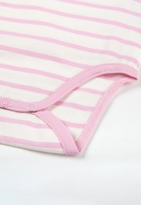 Cotton bodysuit featuring horizontal pink and white stripes, with a pink ribbed neckline and snap buttons at the bottom for easy dressing.