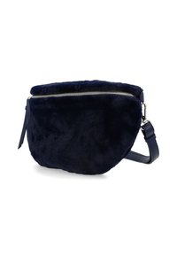 Navyblaue Kunstfelltasche mit runder Form, silbernem Reißverschluss und verstellbarem Lederriemen. Weiche Textur und minimalistisches Design.