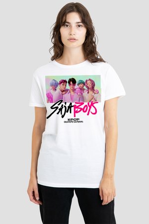 Woman wearing white T-shirt with colorful digital illustration of five K-pop style animated boys and text "Saija Boys Kpop Demon Hunters."