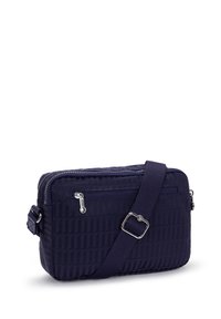 Borsa a tracolla blu navy realizzata in un tessuto testurizzato, con una tasca frontale con zip, cinturino regolabile e motivi geometrici.