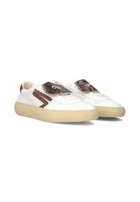 White sneakers with a textured beige sole; features a snake-print panel and brown accents; textile upper with a lace closure design.