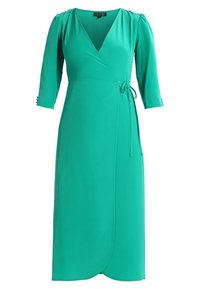 Teal wrap dress made of smooth fabric, featuring three-quarter sleeves, a tie waist, and a deep v-neck. Simple, elegant design.