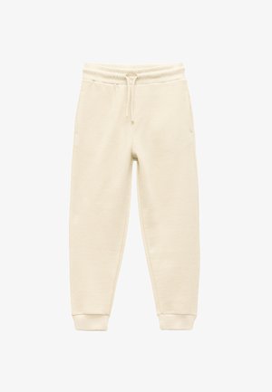 Cremfarbene Jogginghosen aus strukturiertem Waffelstoff. Sie verfügen über einen Kordelzugbund und seitliche Taschen. Die Bündchen an den Knöcheln sind eng anliegend.