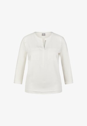 Weißes Langarmblusenshirt mit Rundhalsausschnitt, Knopfleiste vorne und zwei Brusttaschen. Glatte Textur mit leichtem Glanz.