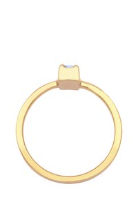 Goldring mit einem minimalistischen quadratischen Rahmen, der einen kleinen rechteckigen hellblauen Edelstein hält.