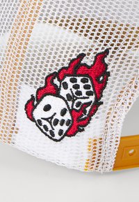 White mesh cap featuring orange plastic band, with red and black embroidered design of dice surrounded by flames on the front panel.